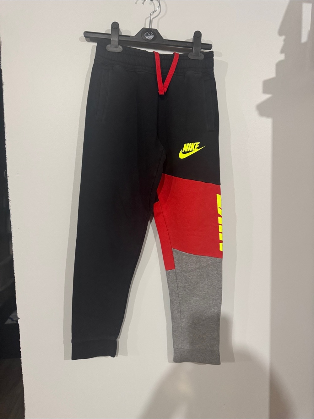 Nike Black/Red/Gray Colorblock Kids Joggers with Yellow Logo
